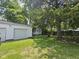 Spacious backyard with garage, shed and mature landscaping at 7831 E 46Th St, Indianapolis, IN 46226