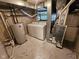 Basement laundry area with included washer and dryer and tiled floor at 7831 E 46Th St, Indianapolis, IN 46226