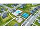 Aerial view of the community featuring a pool, playground, tennis courts, and manicured landscaping at 843 Garrow Dr, Westfield, IN 46074