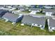 Aerial view showcasing the layout of the backyards, neighboring houses, and green spaces in the community at 843 Garrow Dr, Westfield, IN 46074
