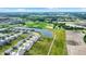 Breathtaking aerial view of new homes with a scenic pond and green spaces nearby at 843 Garrow Dr, Westfield, IN 46074