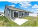 Backyard with a patio featuring seating, a well-maintained lawn, and views of the home's siding and windows at 843 Garrow Dr, Westfield, IN 46074
