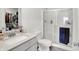 Clean bathroom with white countertops, toilet, glass shower, and silver fixtures at 843 Garrow Dr, Westfield, IN 46074