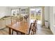 Cozy dining room featuring a large table, comfortable seating, and natural light from sliding glass doors at 843 Garrow Dr, Westfield, IN 46074