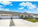 Charming home exterior with a three-car garage, well-manicured landscaping, and a paved driveway at 843 Garrow Dr, Westfield, IN 46074