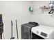 Well-organized laundry area with modern appliances and ample shelving for storage and cleaning supplies at 843 Garrow Dr, Westfield, IN 46074