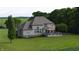 Landscaped backyard features a spacious deck with a charming gazebo, perfect for relaxation and entertaining at 8785 W 100 N, Anderson, IN 46011