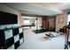 Large finished basement featuring a recreational area and dedicated gym area at 8785 W 100 N, Anderson, IN 46011