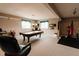 Spacious basement with a pool table, gym equipment, and ample recreational space at 8785 W 100 N, Anderson, IN 46011