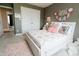 Bright bedroom featuring a plush rug, comfortable bed with soft pillows and decorative wall art at 8785 W 100 N, Anderson, IN 46011