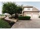 Spacious home featuring a multi-car garage, outdoor patio, and beautifully landscaped backyard at 8785 W 100 N, Anderson, IN 46011