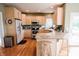 Well-lit kitchen with wood cabinets, countertops, and stainless steel appliances at 8785 W 100 N, Anderson, IN 46011