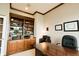 Spacious home office with custom built-ins, providing ample storage and a professional atmosphere at 8785 W 100 N, Anderson, IN 46011