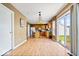 Bright eat-in kitchen with wood cabinets and sliding glass doors to the backyard at 8877 N White Tail Trl, McCordsville, IN 46055