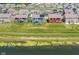 Aerial view of a neighborhood featuring many homes and a community pond at 9053 Fitzgerald Dr, Indianapolis, IN 46239