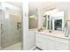 Renovated bathroom with glass shower and modern vanity at 9053 Fitzgerald Dr, Indianapolis, IN 46239