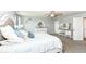 Bright bedroom features decor, neutral walls, carpet, and ceiling fan at 9053 Fitzgerald Dr, Indianapolis, IN 46239