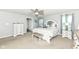 Bright bedroom features neutral walls, carpet, and ceiling fan at 9053 Fitzgerald Dr, Indianapolis, IN 46239