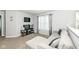 A comfortable loft space with a sofa and tv offers a relaxed setting for leisure and recreation at 9053 Fitzgerald Dr, Indianapolis, IN 46239
