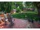 Spacious backyard deck with comfortable seating, perfect for outdoor entertaining in a private, grassy yard at 919 Dreamy St, Greenwood, IN 46142