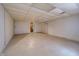 Unfinished basement featuring white walls, drop ceiling, and single doorway at 919 Dreamy St, Greenwood, IN 46142