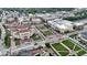 Aerial view of downtown area featuring theaters, parks, and landscaped green spaces at 925 Veterans Way # 101, Carmel, IN 46032