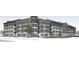 New construction, multi-story apartment building with a brick facade and classic architectural design at 925 Veterans Way # 101, Carmel, IN 46032