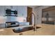 Bright kitchen featuring stainless steel appliances, a modern faucet, and a spacious countertop, perfect for culinary enthusiasts at 925 Veterans Way # 101, Carmel, IN 46032