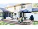 Lovely outdoor living area, complete with a patio, grill, and a screened-in porch at 9710 Iroquois Ct, Indianapolis, IN 46256