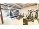 Finished basement area features home gym equipment, perfect for fitness enthusiasts at 9710 Iroquois Ct, Indianapolis, IN 46256