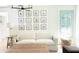 Bright living room with coastal-themed decor, a sofa, and natural light at 9710 Iroquois Ct, Indianapolis, IN 46256