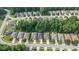Charming homes nestled among lush greenery in a peaceful neighborhood at 9735 Woodsong Ln, Indianapolis, IN 46229
