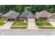 Aerial view of a charming single-Gathering home with well-manicured lawn and inviting curb appeal at 9735 Woodsong Ln, Indianapolis, IN 46229