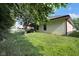 Lush green backyard with mature trees providing shade and privacy for outdoor enjoyment at 9735 Woodsong Ln, Indianapolis, IN 46229