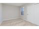 This bedroom is well-lit by a window and features neutral colors, carpet, and a closet at 9737 Oleander Dr, Fishers, IN 46250