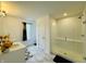 Bathroom with a double vanity, a glass-enclosed shower, and white tiling at 980 S Raylee Garden Dr, New Palestine, IN 46163