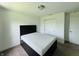 Bedroom featuring carpet flooring and a view from the window to the outside at 980 S Raylee Garden Dr, New Palestine, IN 46163