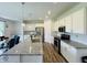 Bright kitchen featuring granite countertops, stainless steel appliances, and an island at 980 S Raylee Garden Dr, New Palestine, IN 46163