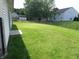 View of the fenced in backyard with grassy lawn at 10178 Cornith Way, Avon, IN 46123