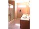 Bathroom features a double vanity, enclosed shower, and natural light at 10178 Cornith Way, Avon, IN 46123