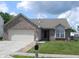 Charming single-story brick home featuring an attached garage, well-maintained lawn, and inviting curb appeal at 10178 Cornith Way, Avon, IN 46123