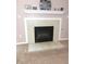 Cozy fireplace with tile surround and mantel, perfect for relaxing evenings at 10178 Cornith Way, Avon, IN 46123