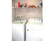 Laundry room includes washer, dryer, and storage shelf at 10178 Cornith Way, Avon, IN 46123