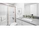 Bathroom with a walk-in shower, single sink vanity and neutral color palette at 10262 Rieslaner Cir, Zionsville, IN 46077