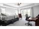 Spacious main bedroom with desk, multiple windows, and neutral tones at 10262 Rieslaner Cir, Zionsville, IN 46077