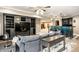Finished basement featuring a large entertainment center, custom bar, and comfortable seating at 1037 Deer Lake Dr, Carmel, IN 46032