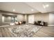 Finished basement featuring a large mirror, workout area, neutral color scheme, and stylish flooring at 1037 Deer Lake Dr, Carmel, IN 46032