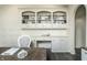 Spacious home office with custom built-ins providing ample storage and workspace at 1037 Deer Lake Dr, Carmel, IN 46032
