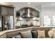 Gourmet kitchen with stainless appliances, custom cabinetry, and granite counters, perfect for entertaining at 1037 Deer Lake Dr, Carmel, IN 46032