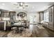 Open kitchen and breakfast nook featuring modern cabinetry, stainless appliances, and stylish fixtures at 1037 Deer Lake Dr, Carmel, IN 46032
